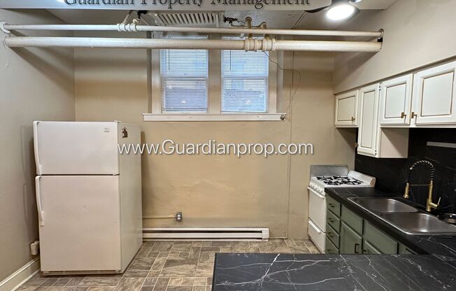 Uptown Basement Level, Heat Paid, Parking Available, Vaulted Ceilings, Storage Available,.