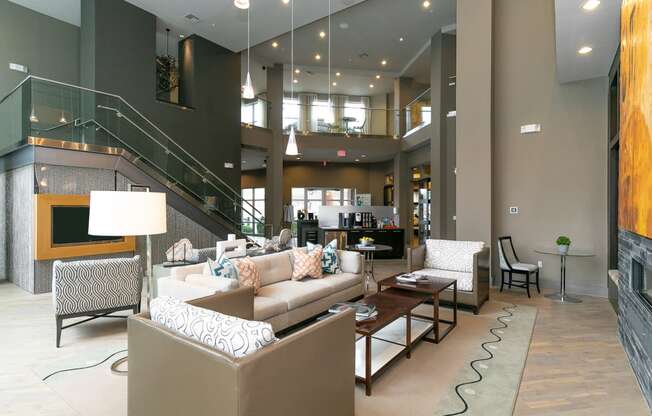 a living room filled with furniture and a fire place