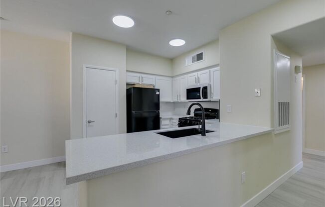 3-Bedroom Henderson Condo with Private Balcony & Garage