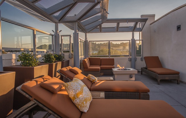 Sit back and relax on our rooftop deck with lounge seating and a fireplace