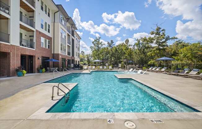the preserve at ballantyne commons pool and apartment buildings