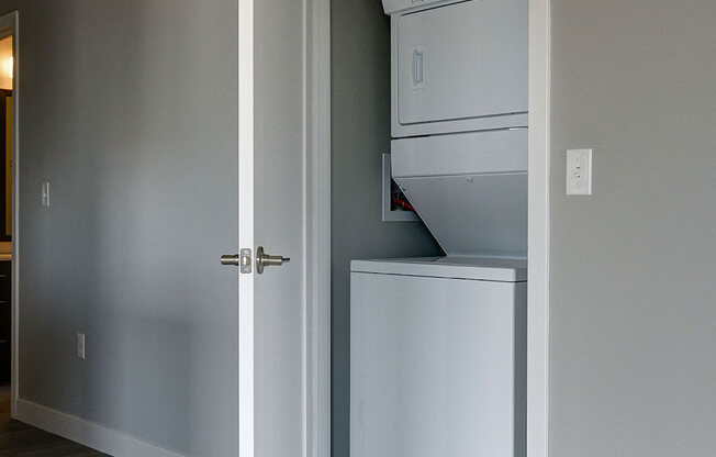 a laundry room with a washer and dryer