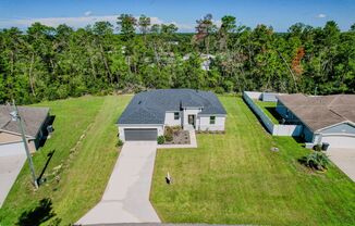 New construction home for rent in Marion Oaks with oversized backyard!