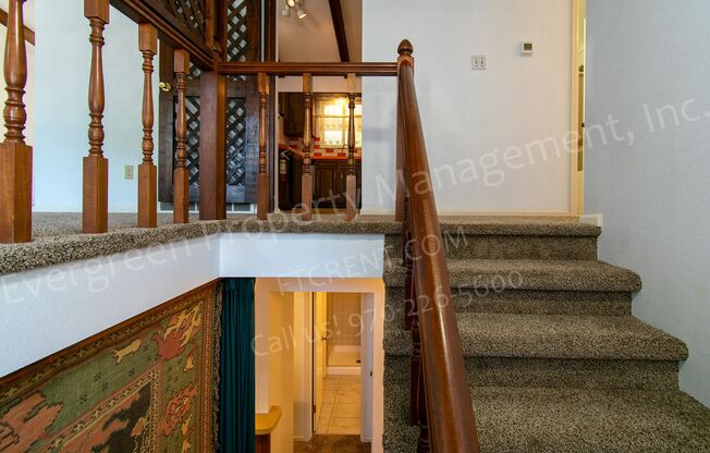 Charming Bi-Level Home in Desirable Mission Hills with a Sunroom, A/C and a Fireplace!