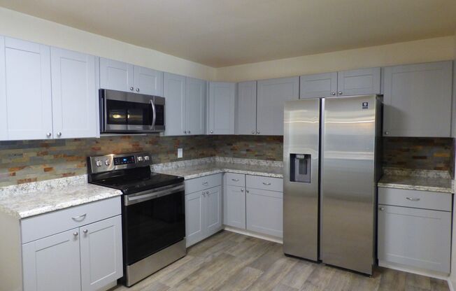 Remodeled 3 Bed 2 Bath Brick Home