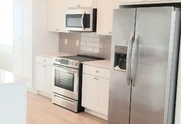 Brand New 3 Bedroom Townhome with Garage and In-Unit Laundry