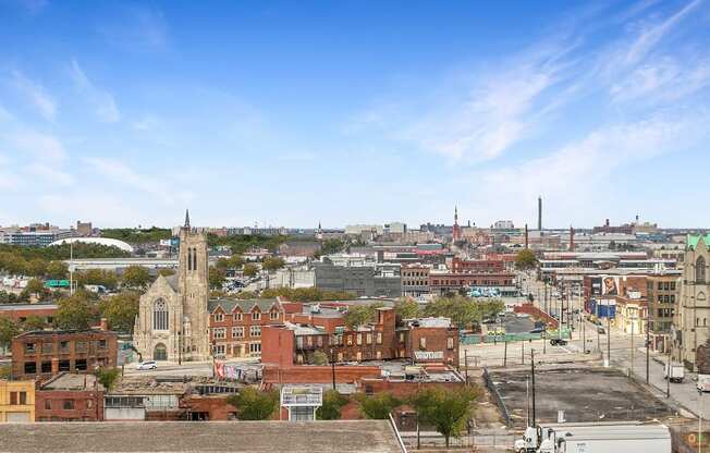 a view of the city from the top of a building