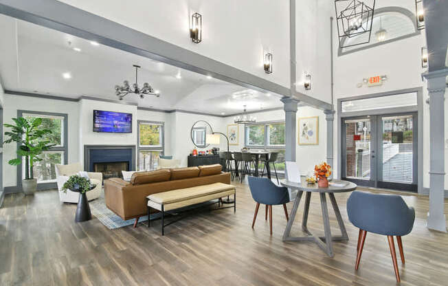 A modern living room with a fireplace and a television.