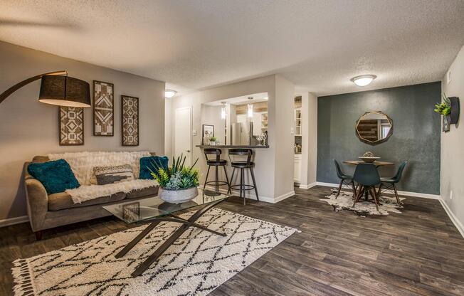 a living room filled with furniture and a fireplace