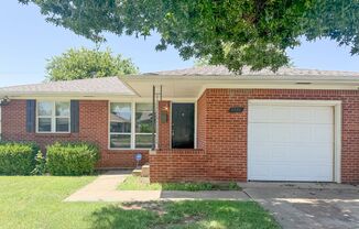 3116 NW 65th St | Hardwood Floors + Sunroom | NW OKC