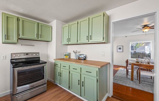 1/2 Month Free! Storybook Farmhouse - Updated Kitchen, A/C, Basement, Fenced Yard, Garage, Laundry, and More!