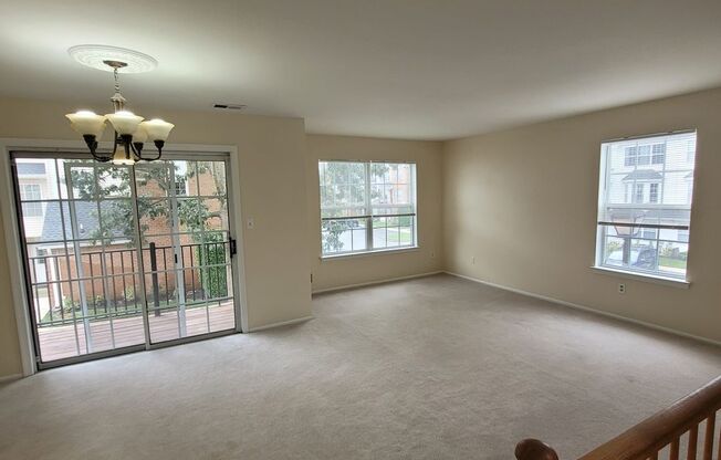 Spacious, freshly painted with lots of amenities describes this centrally located, tri-level townhouse!