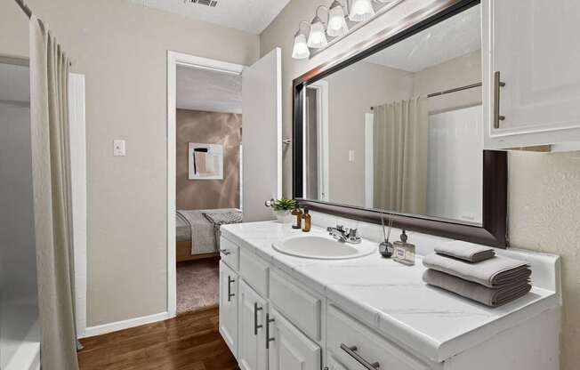 Virtually staged b2 bathroom at Noel on the Parkway in Dallas, TX