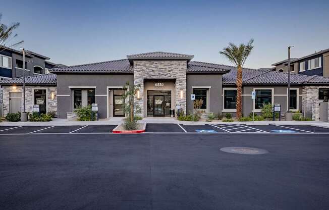 Future resident parking in front of Level 25 at The Curve's leasing building entrance.