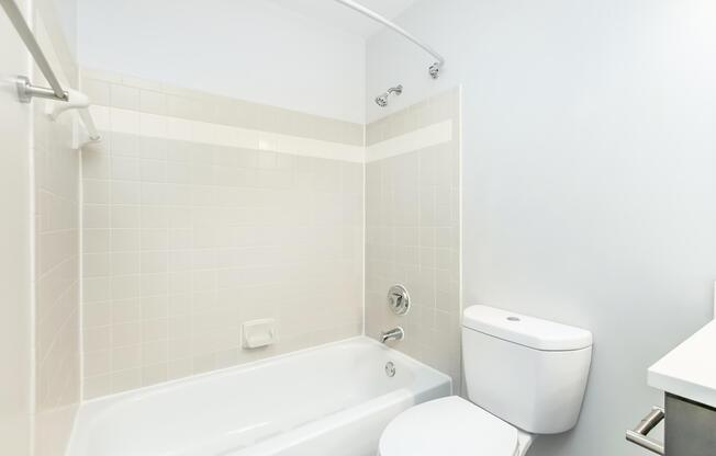 a room with a sink and a mirror