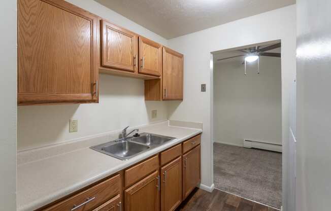 This is a photo of the kitchen in the 705 square foot, 1 bedroom, 1 bath apartment at Blue Grass Manor Apartments in Erlanger, KY.