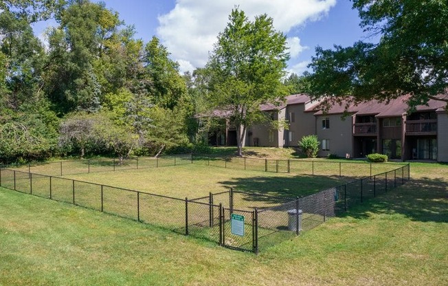 Fenced in dog park on site