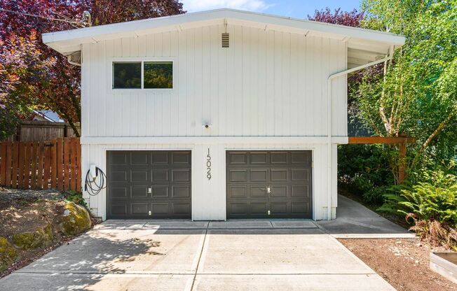 Completely Remodeled Kenmore Home with Two-Car attached Garage and Fenced Backyard!