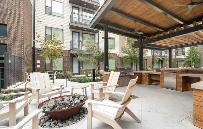 Outdoor Lounge with Fire Pit and Grilling Area