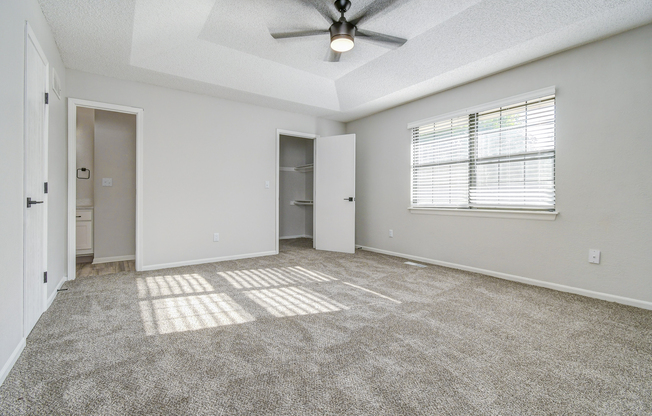 Empty townhome platinum bedroom interior at The Arbor in Blue Springs, Missouri