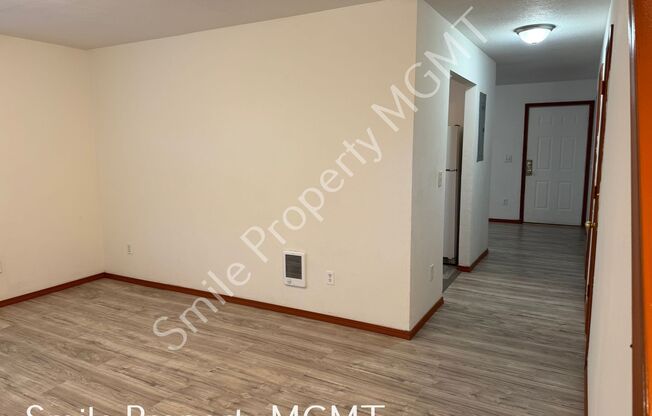 A nice house with 3 beds rooms and 1.5 baths.