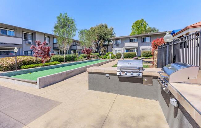 a train is parked on the side of a building