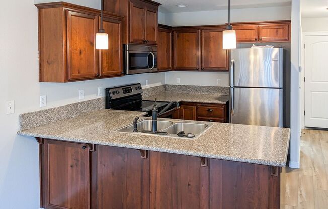 407 AND 409 MADRONA AVE SE