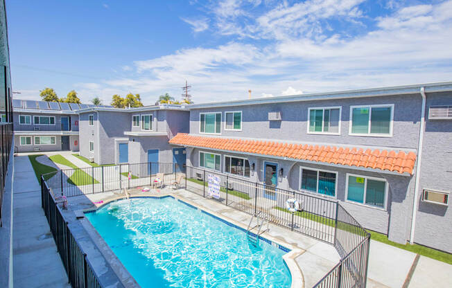 our apartments have a large pool and a building with a roof