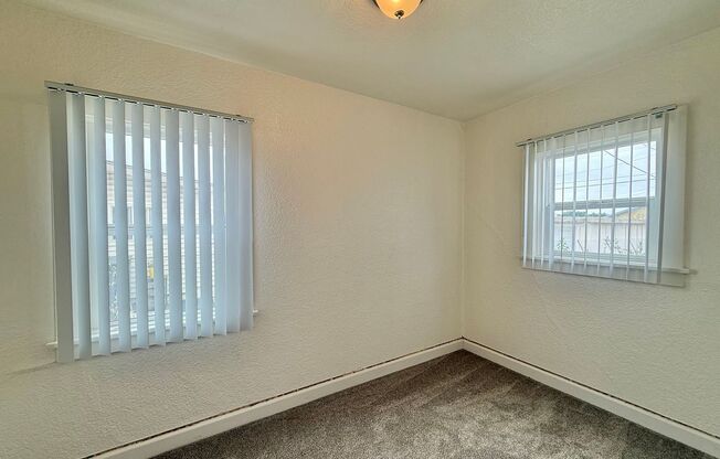 2 Bedroom Cottage nestled in City Heights! With Parking!!