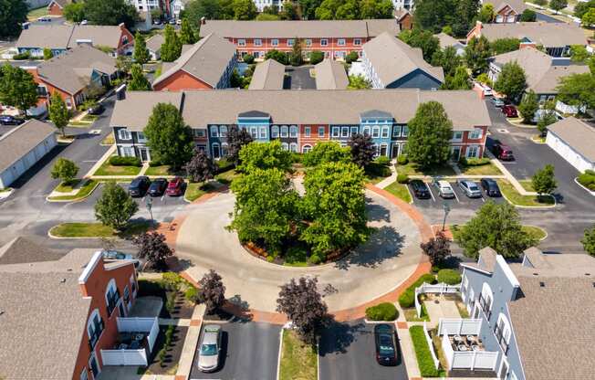 an aerial view of a neighborhood with houses and trees