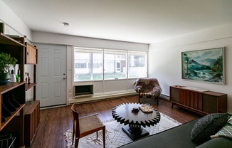 a living room with a couch and a table