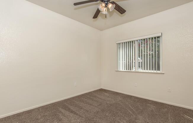 a bedroom with a bed and a mirror