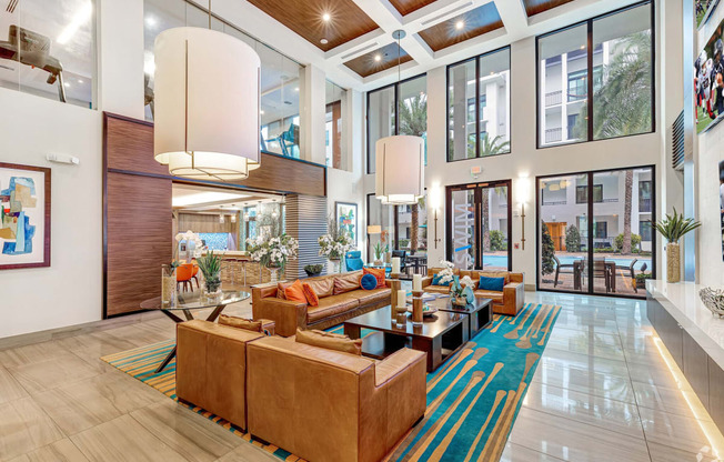 a large lobby with couches and a coffee table