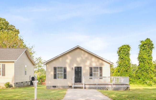 NE, Updated Home, Just Painted, New Wood/Vinyl Flooring, Front Porch, Deck!