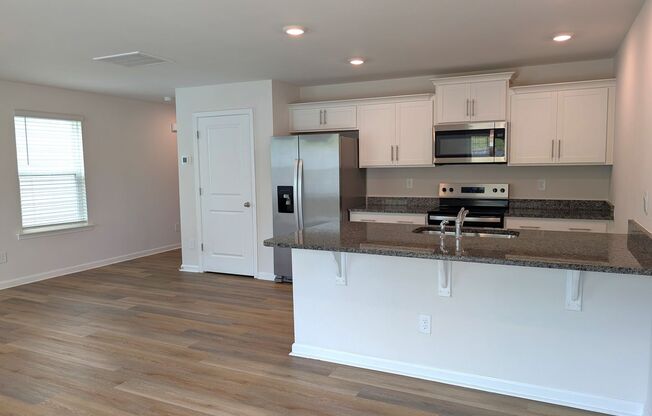 Beautiful, end-unit, townhome located in the Mallard Creek Towns Community in Charlotte!