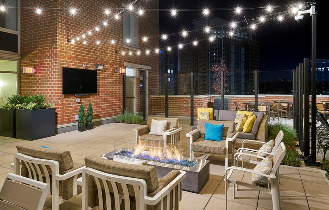 Your new favorite hangout. Unwind in our updated outdoor lounge, complete with cozy fire pits, ambient fairy lights, and plenty of seating for friends.