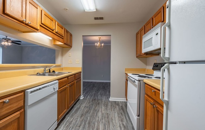 Lancaster Place Apartments in Calera Alabama photo of kitchen with white appliances