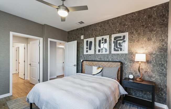 Bedroom with a large bed and a ceiling fan at Array La Mesa, La Mesa