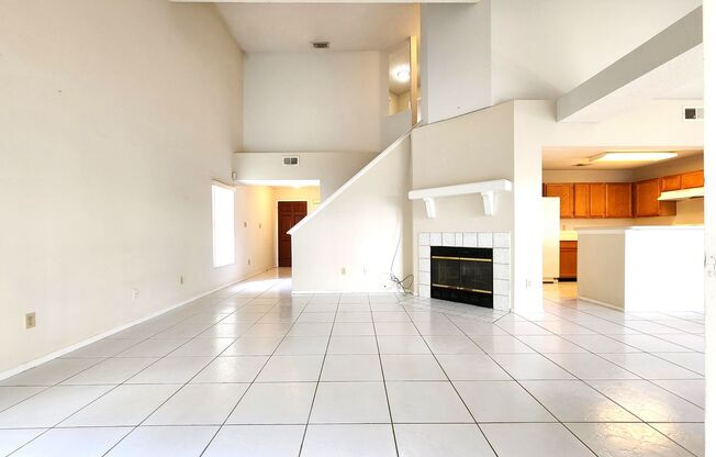 Open Layout; Fenced-in Yard; First Floor Bedroom with Ensuite Bath; Fireplace