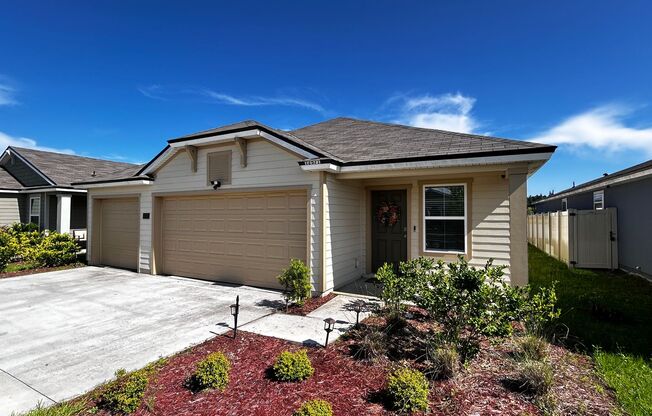 Picturesque Waterfront 4-Bedroom Home with Premium Amenities + 3 Car Garage! Community Amenities!