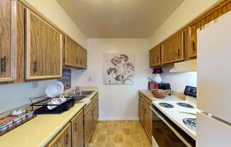 A  kitchen with a refrigerator