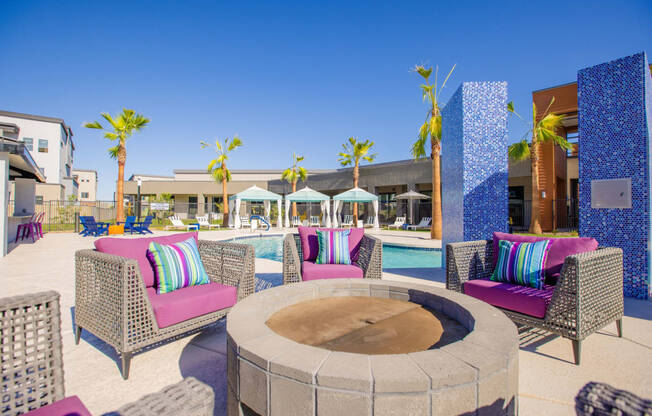 1 Bedroom Apartments in Gilbert AZ - Curve At Gilbert - Outdoor Lounge With Cozy Patio Furniture, A Fire Pit, And A Pool