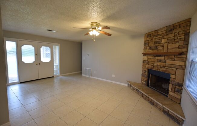 4 Bedroom 2 bath with Fireplace on a corner lot