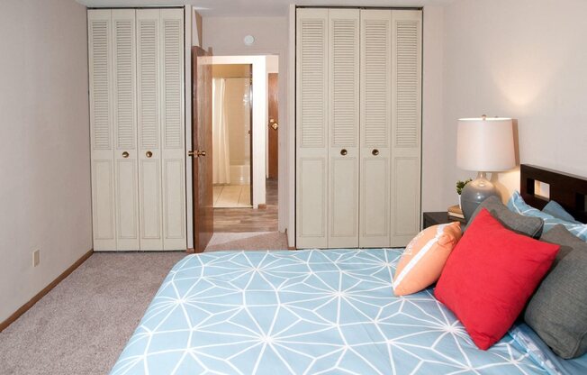 Two Double Door Closets in Master Bedroom of Boulevard 100 Apartments in St. Louis Park, MN