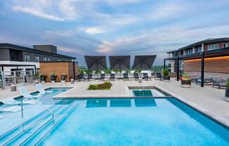 Resort-style rooftop pool with views and plenty of space to unwind or connect.