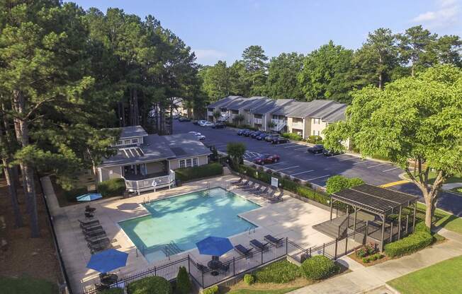 Aerial view of surrounding at Harvard Place Apartment Homes by ICER, Lithonia, GA