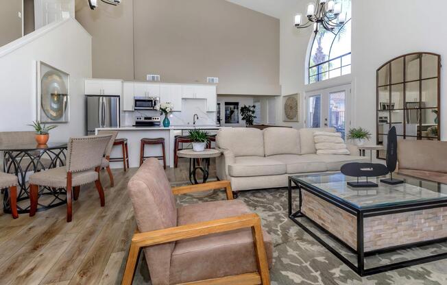 a living room filled with furniture and a fireplace