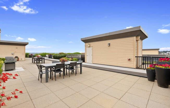 the roof terrace with resident seating areas to enjoy views at Villaggio Apartment Homes, Washington