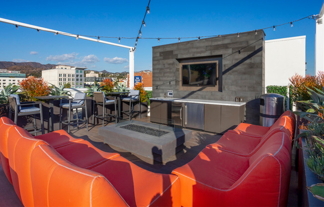 Rooftop lounge with HDTV, firepit, and stunning views