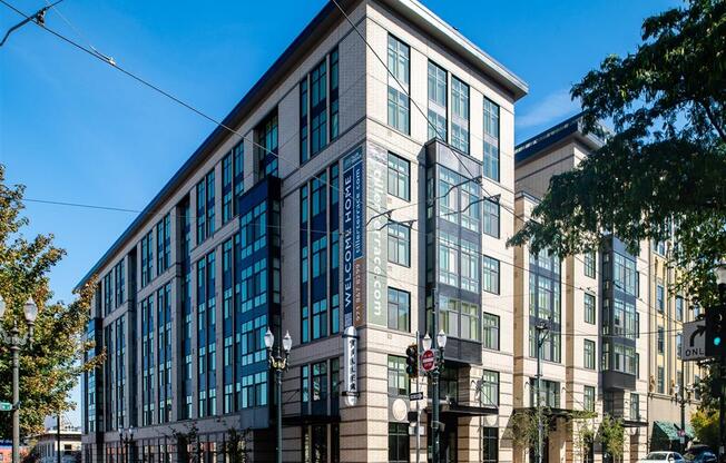 a large building on the corner of a city street